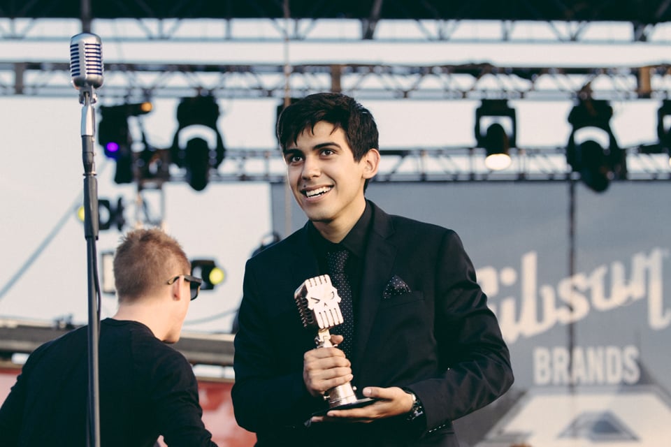 Andrew Velasquez of Crown The Empire accepting their Breakthrough Band award