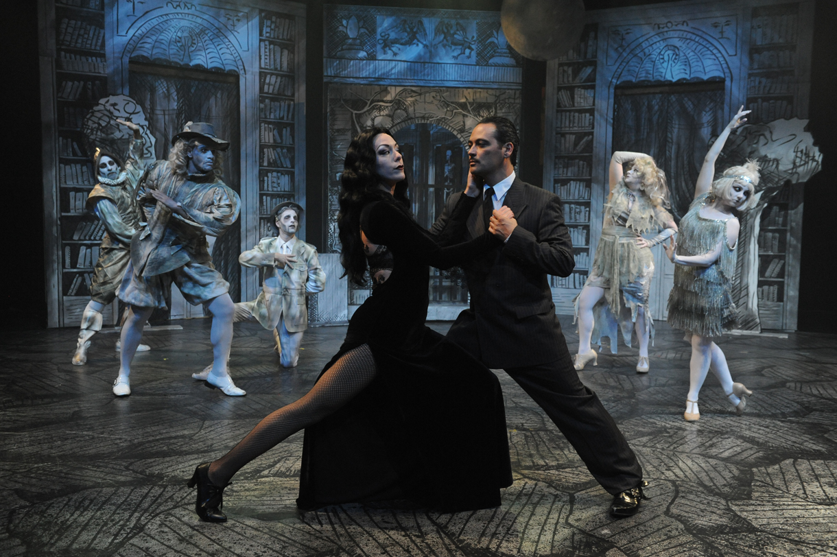 Dave Lepori / San Jose Stage Allison F. Rich as Morticia, left, and Johnny Moreno as Gomez dance the "Tango de Amor" with a little help from the ensemble in "The Addams Family" at San Jose Stage, June 3 through July 26, 2015.